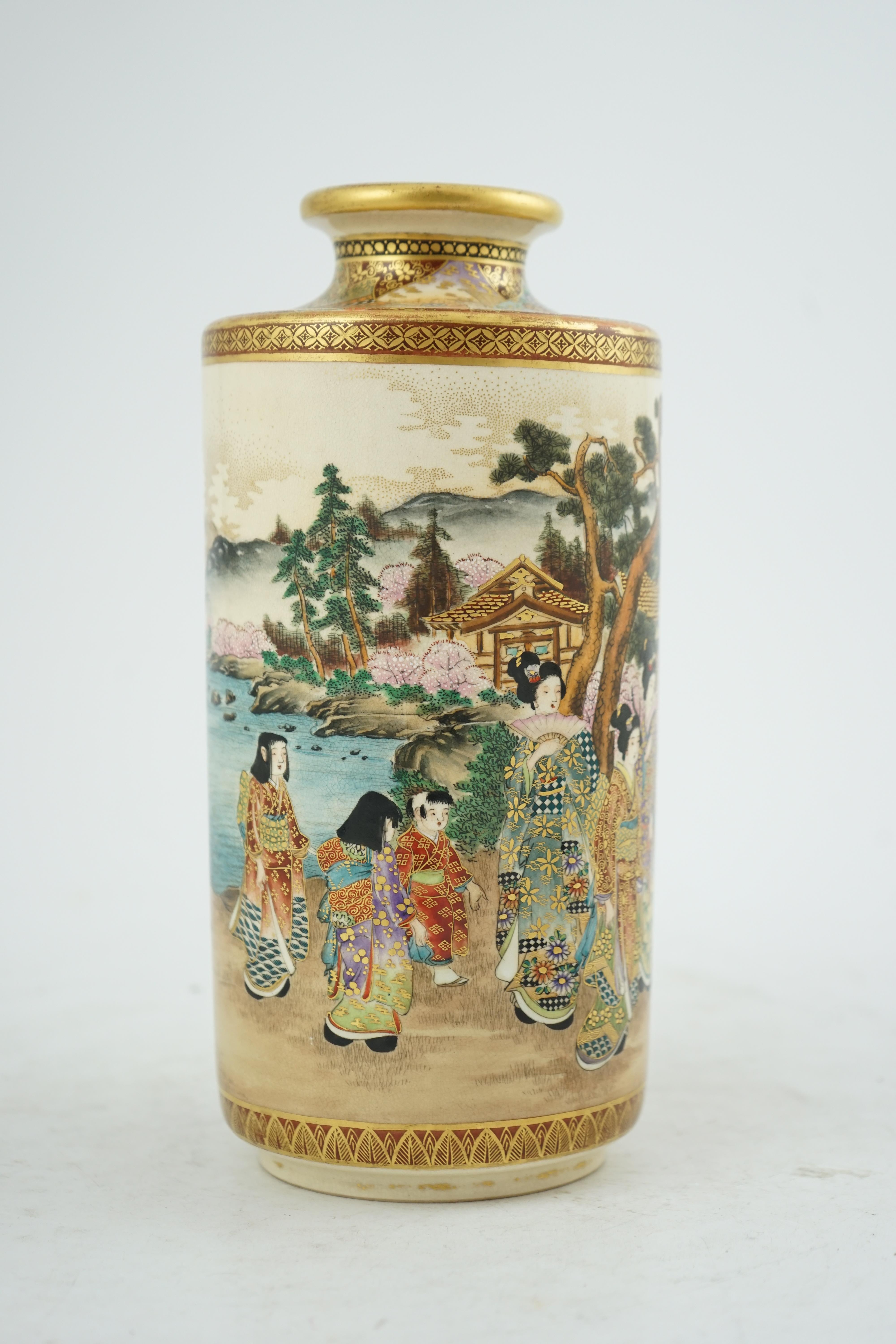 A Japanese Satsuma ‘Spring festival’ cylindrical vase, Meiji period